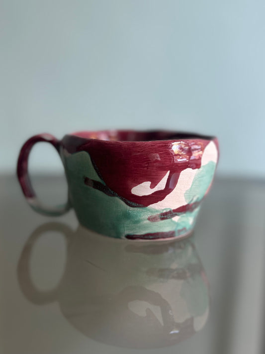 Tazza verde acqua e rossa rubino