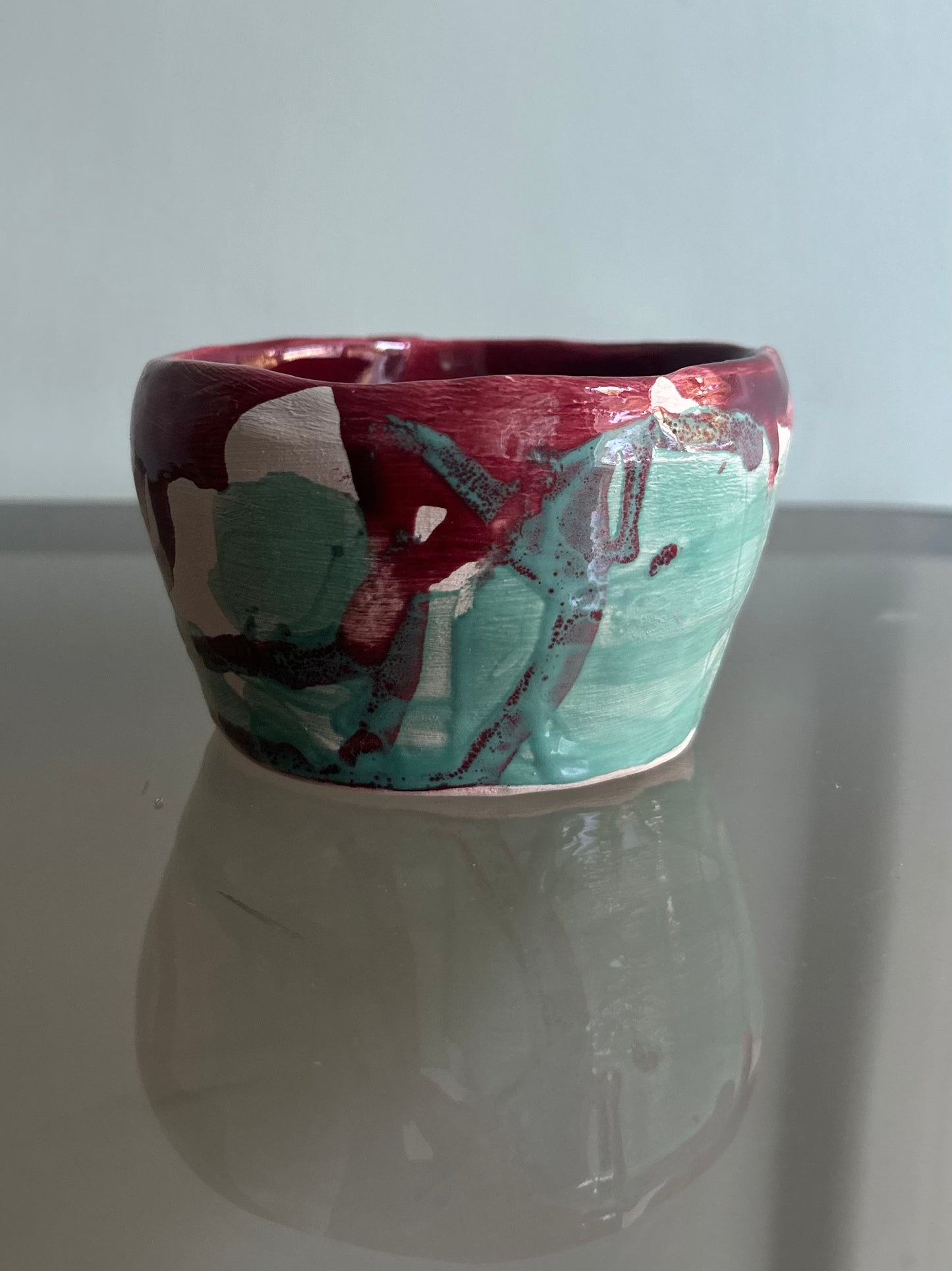 Tazza verde acqua e rossa rubino