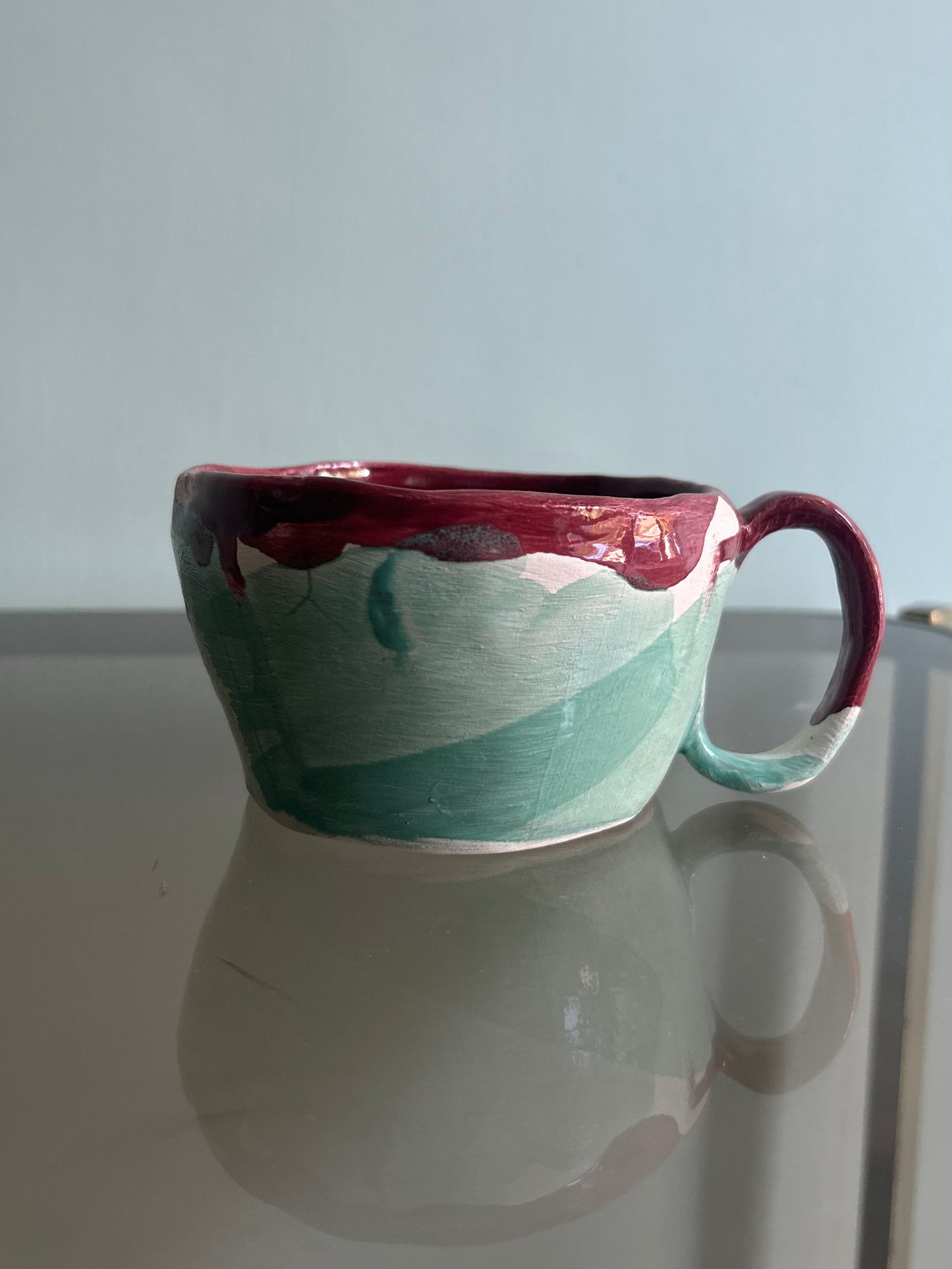 Tazza verde acqua e rossa rubino