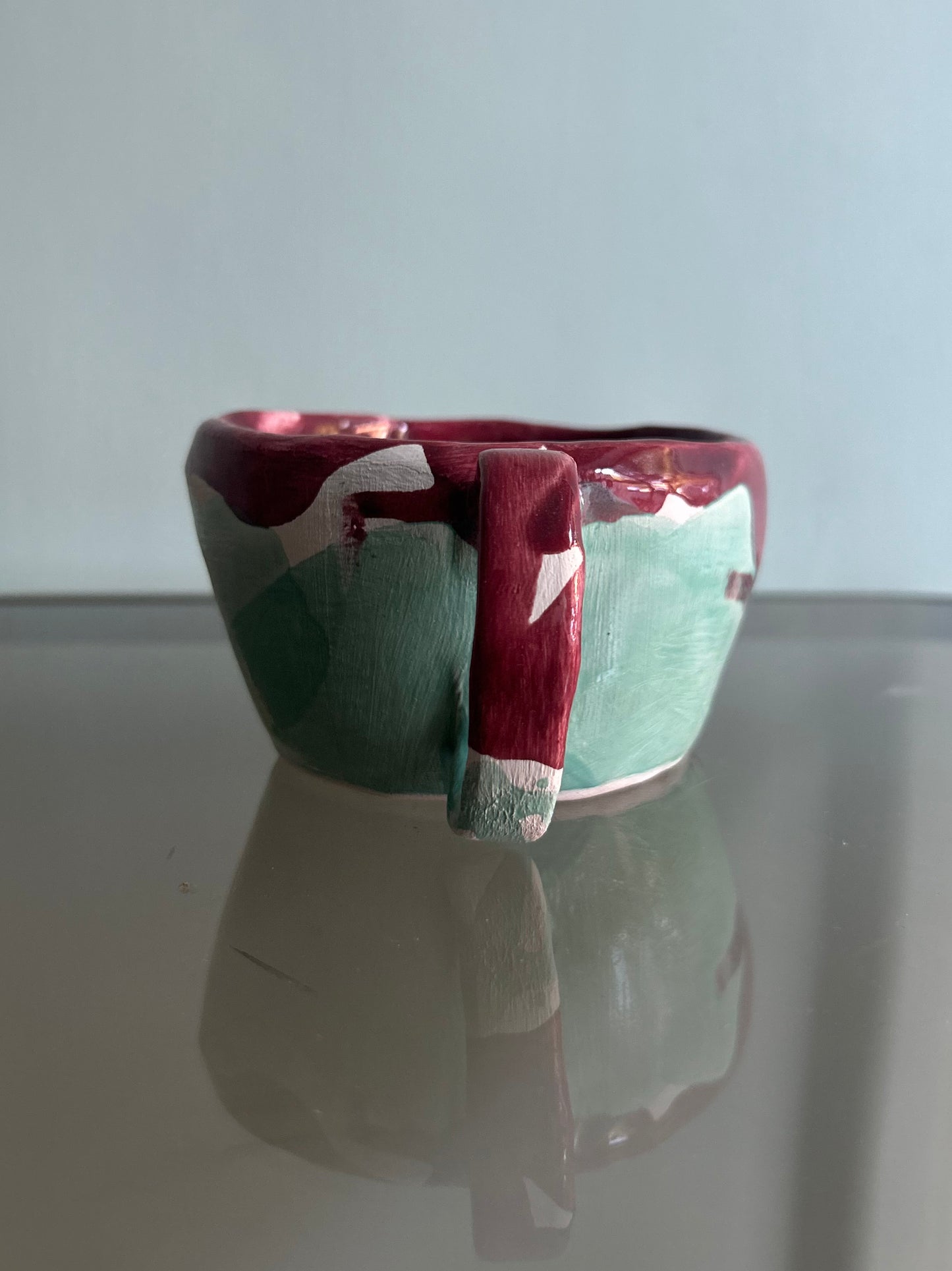 Tazza verde acqua e rossa rubino